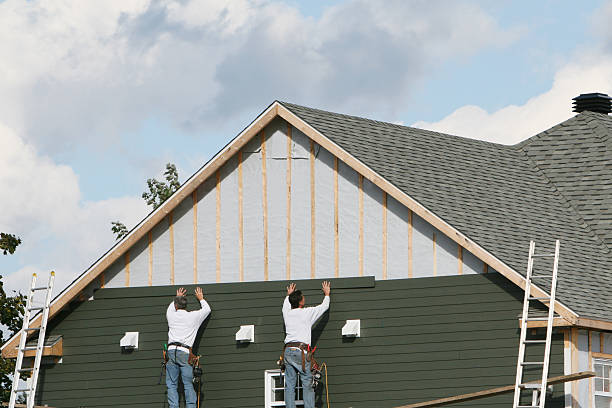 Professional Siding Contractor technician working in Woodleaf, NC